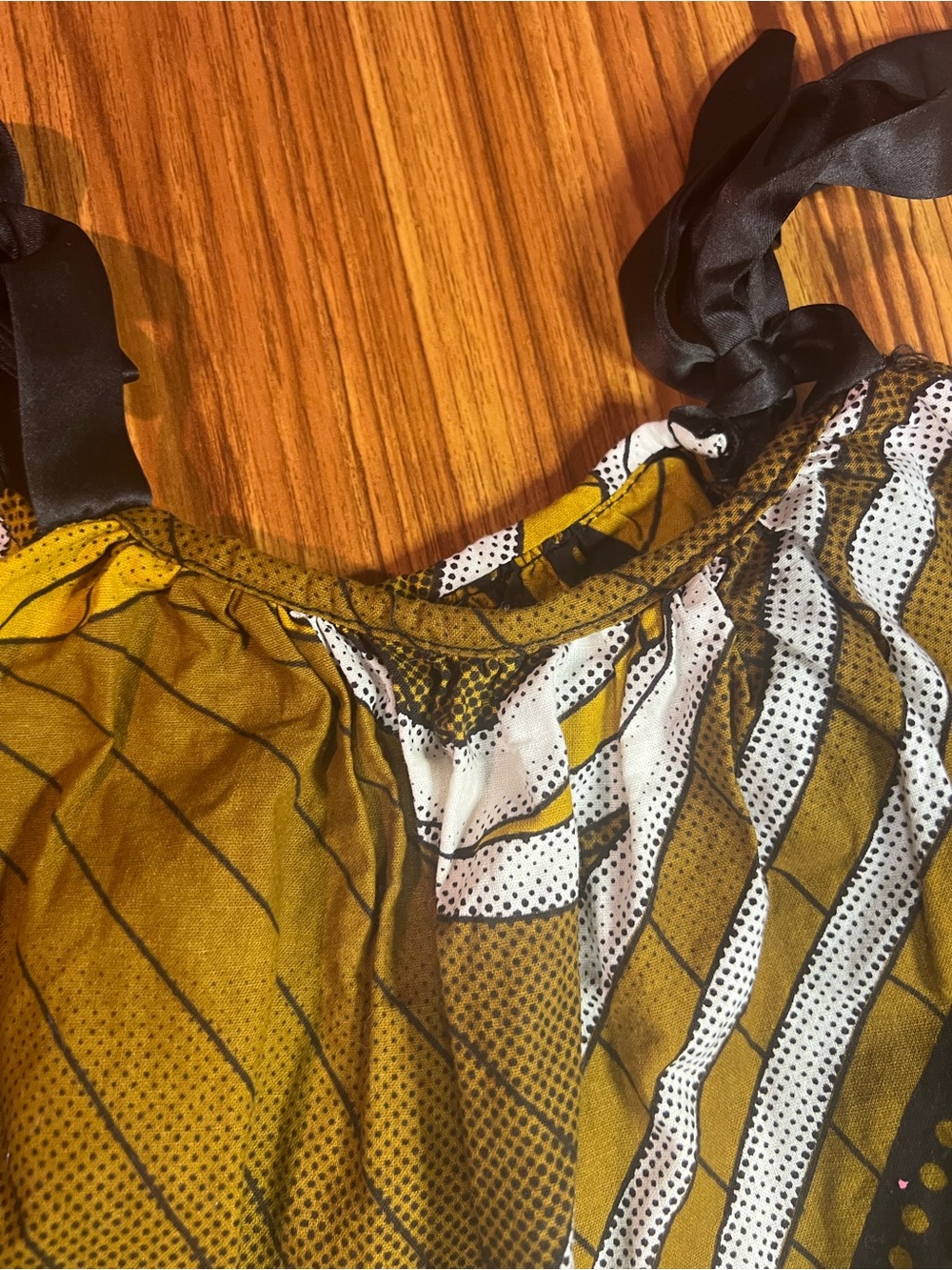 African print dress with black shoulder tie